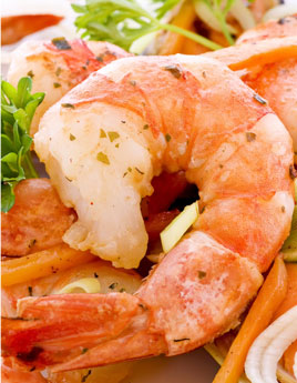 Grilled shrimp on a serving plate