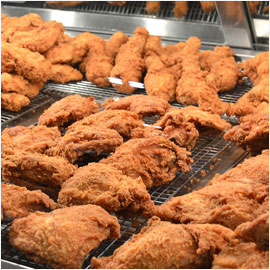 Dave's Crispy Fried Chicken on a cooling rack